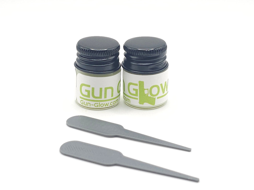 2 bottles of gun glow and stirring sticks